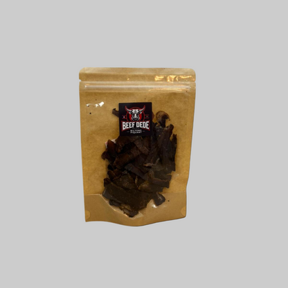 Kraft paper packaging of beef jerky with a visible brand logo on a light gray background